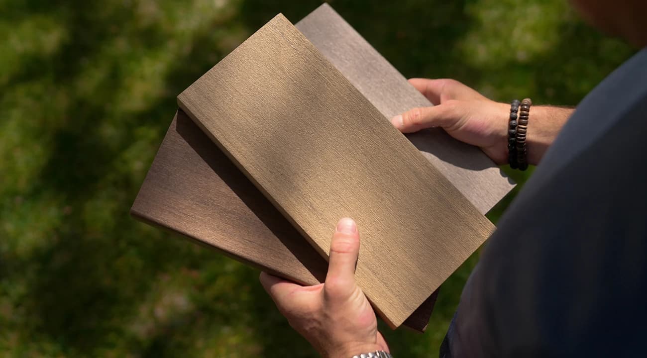 Person holds deck samples